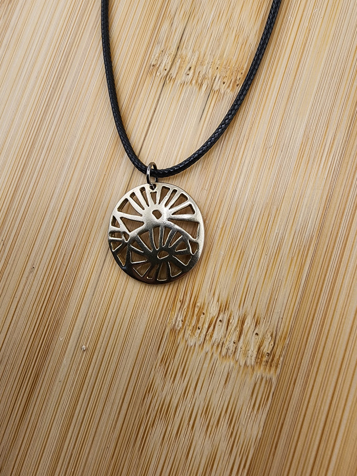 18in Adjustable Gold Tone Sunburst Pendant Necklace on Black Cord -