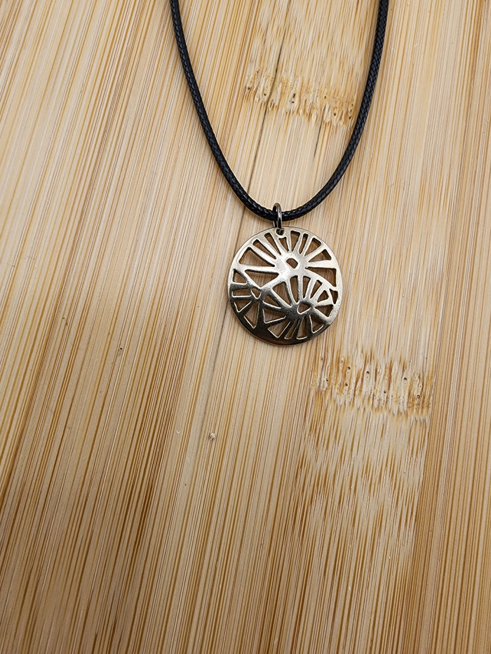 18in Adjustable Gold Tone Sunburst Pendant Necklace on Black Cord -