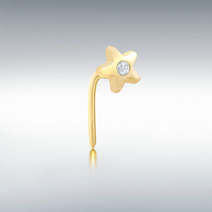 Gold star nose piercing