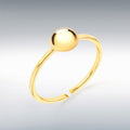 Gold labret stud with a round gold ball on a gray background