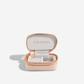 Pink jewelry case with 'Stackers' branding on a white background